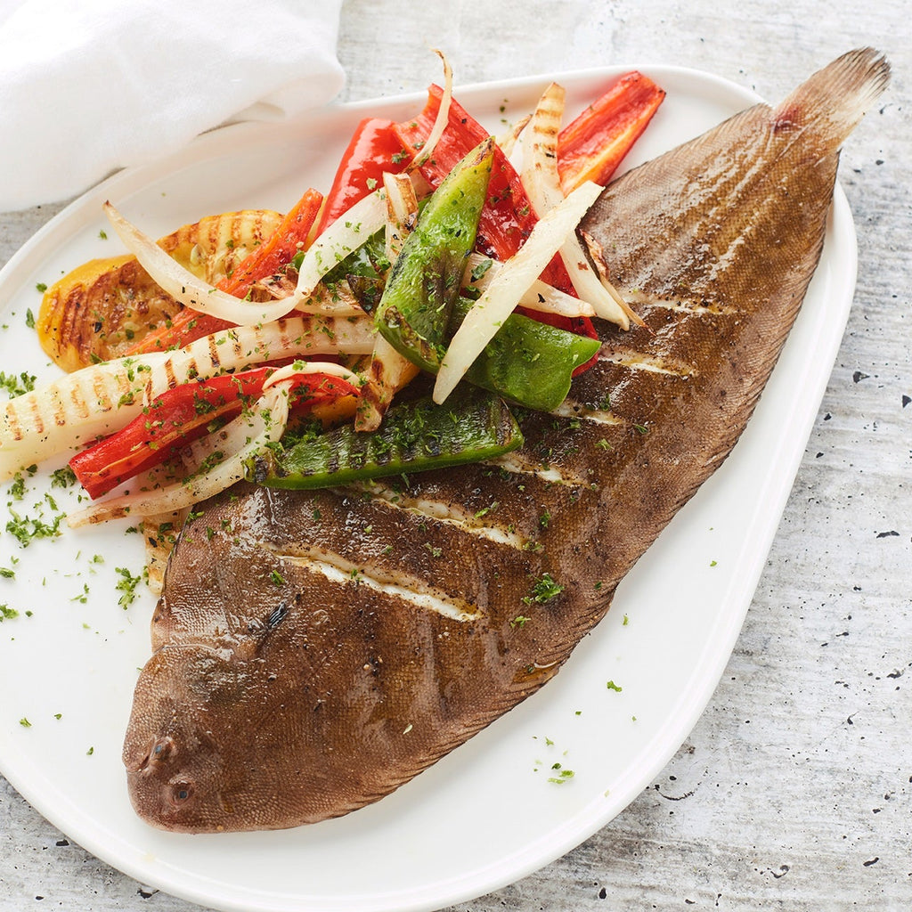 Grilled sole fillet with vegetables on the BBQ