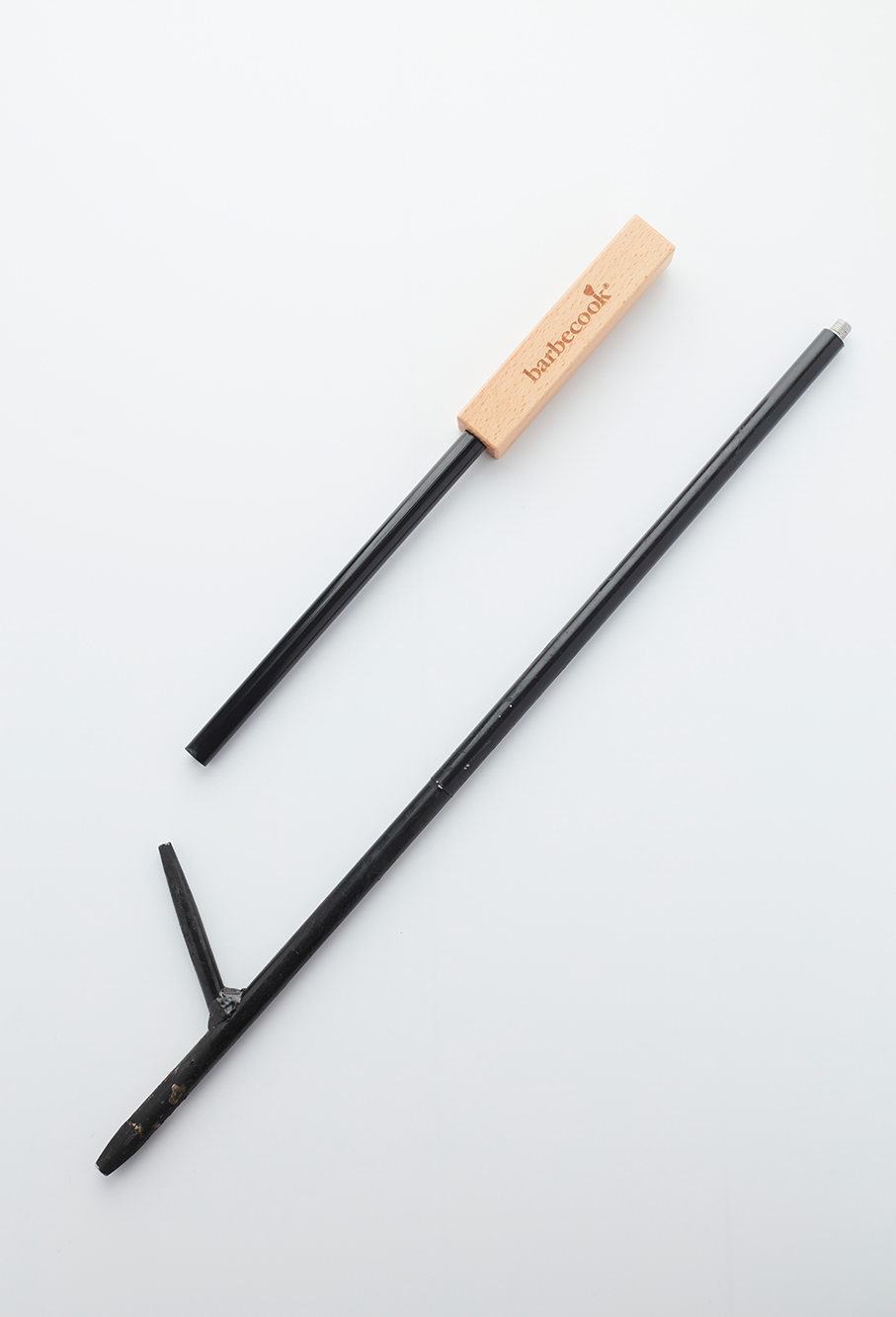 Fire poker with blowhole