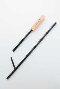 Fire poker with blowhole