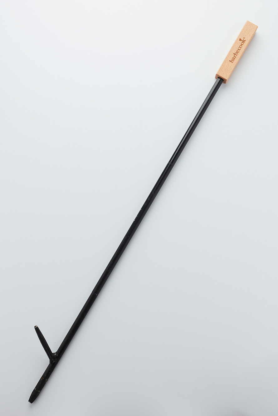 Fire poker with blowhole