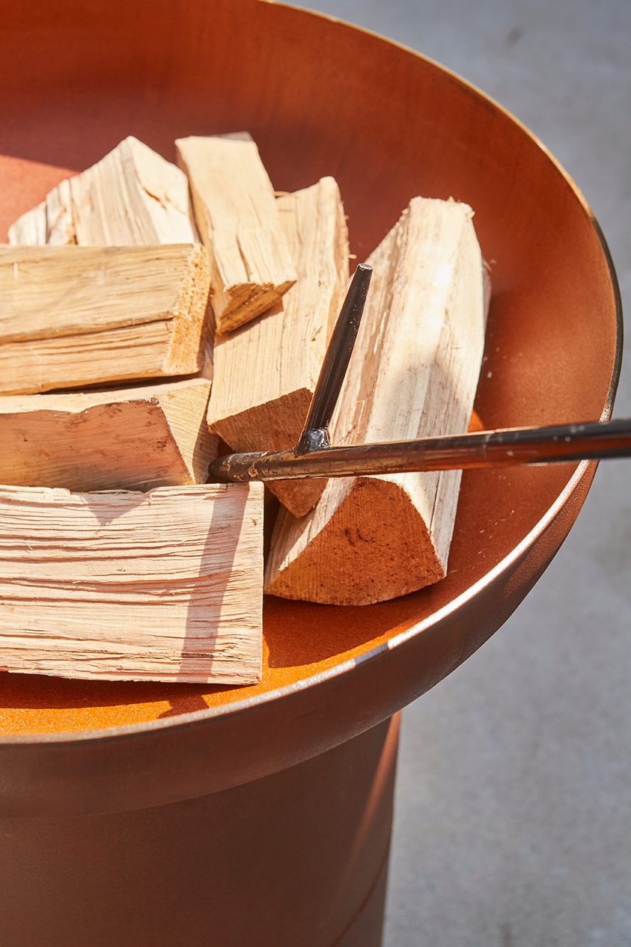 Fire poker with blowhole