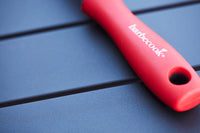 Plancha spatule anti-griffe en nylon rouge